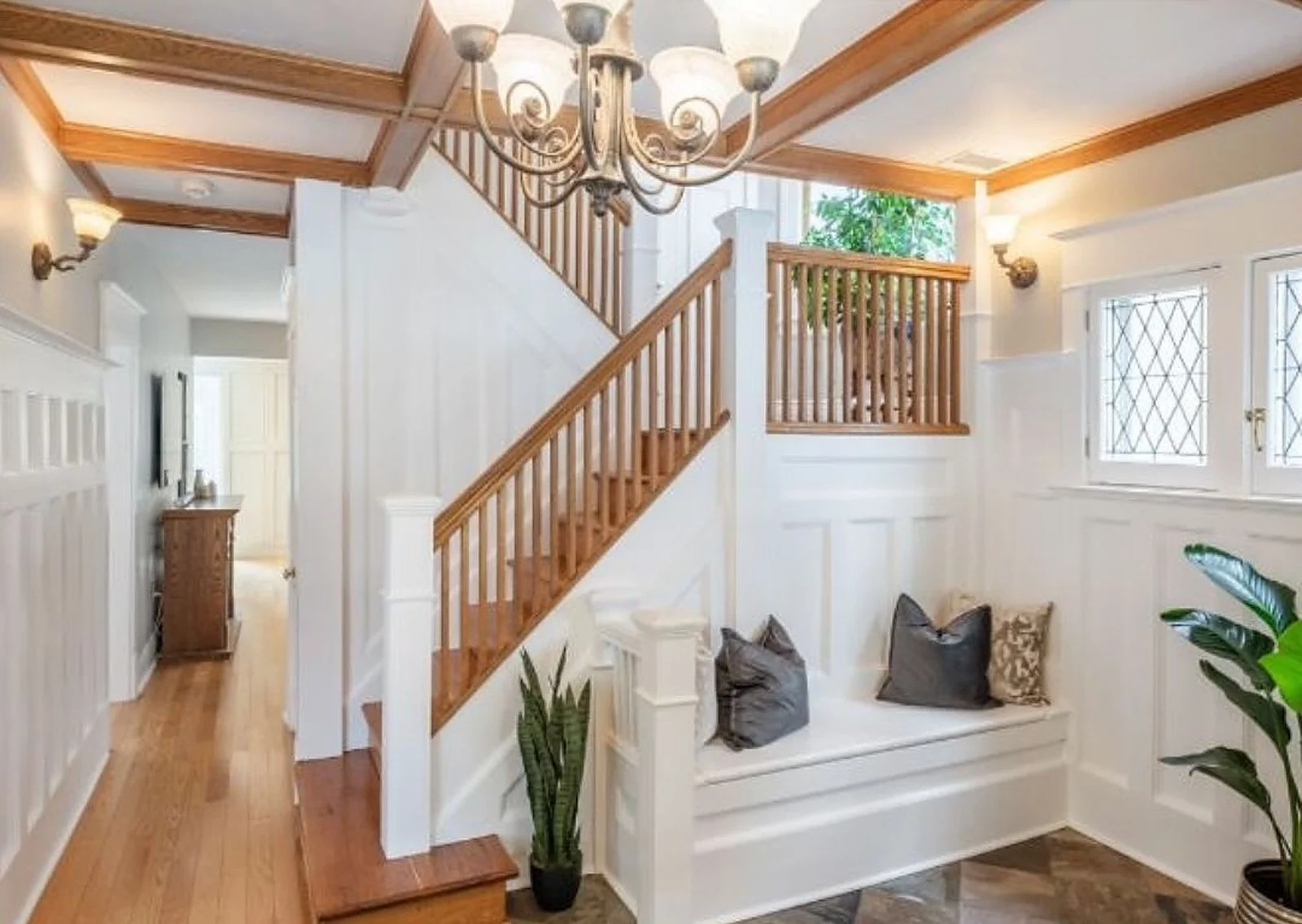 Foyer with staircase painted white