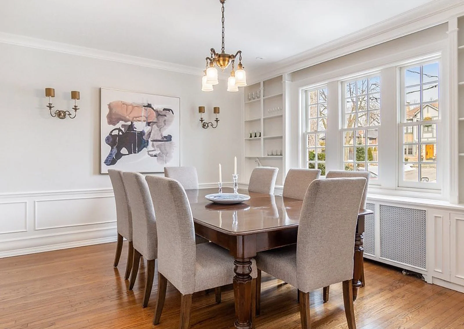Dining room in soft white, staged for listing