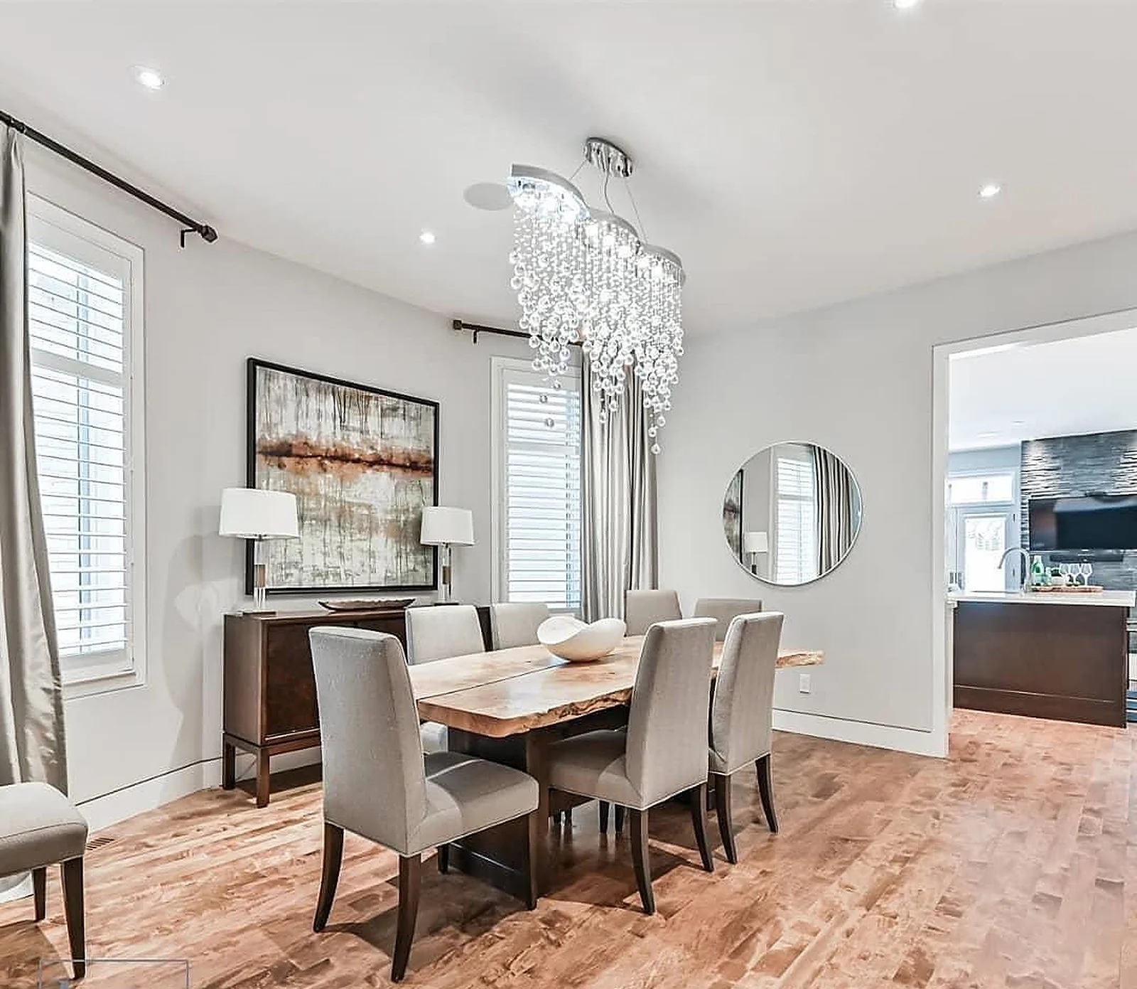 White dining room, crystal chandelier