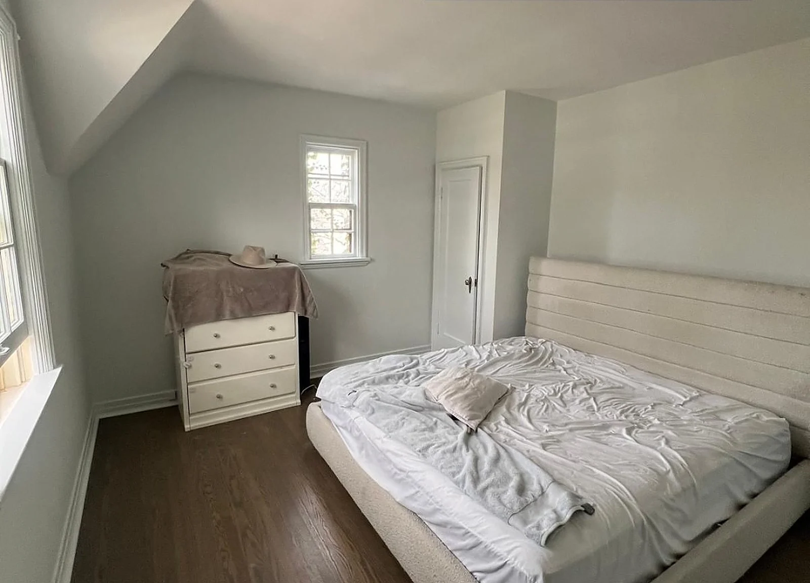 AFTER: bedroom painted light grey/white