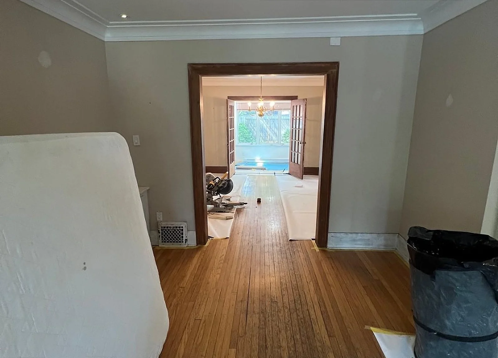 BEFORE: dining room taupe walls, dark trim