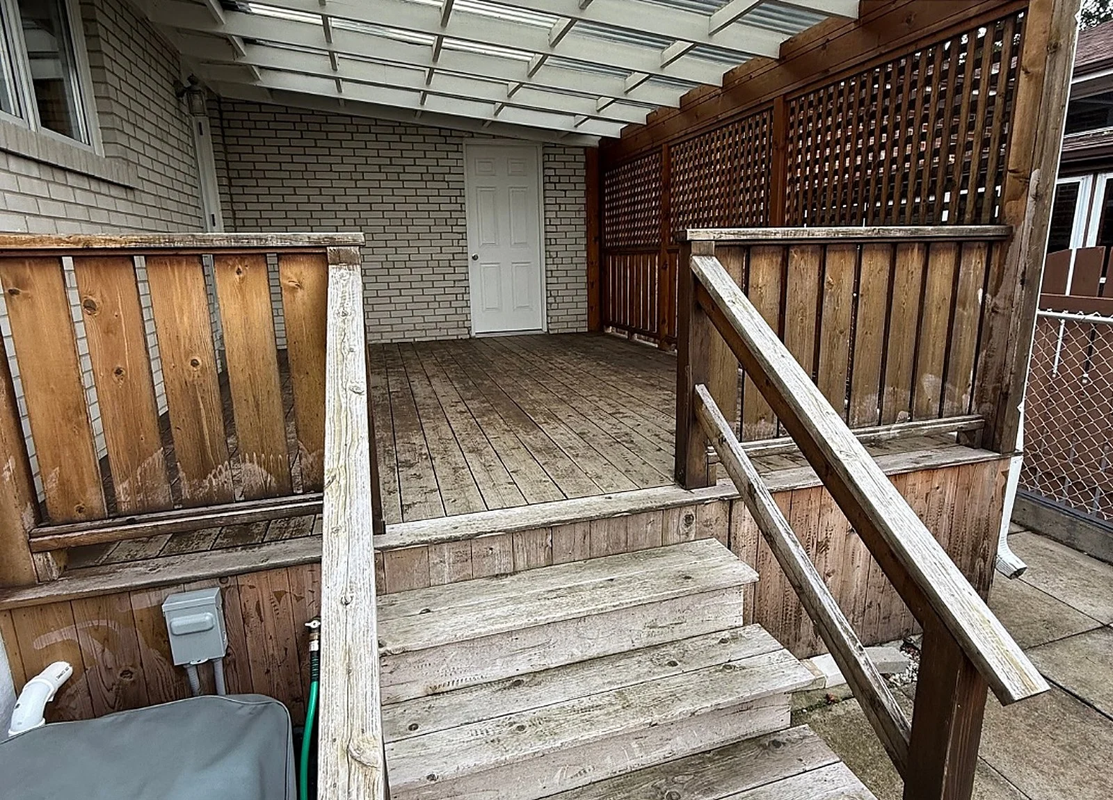 BEFORE: cedar deck stairs grey