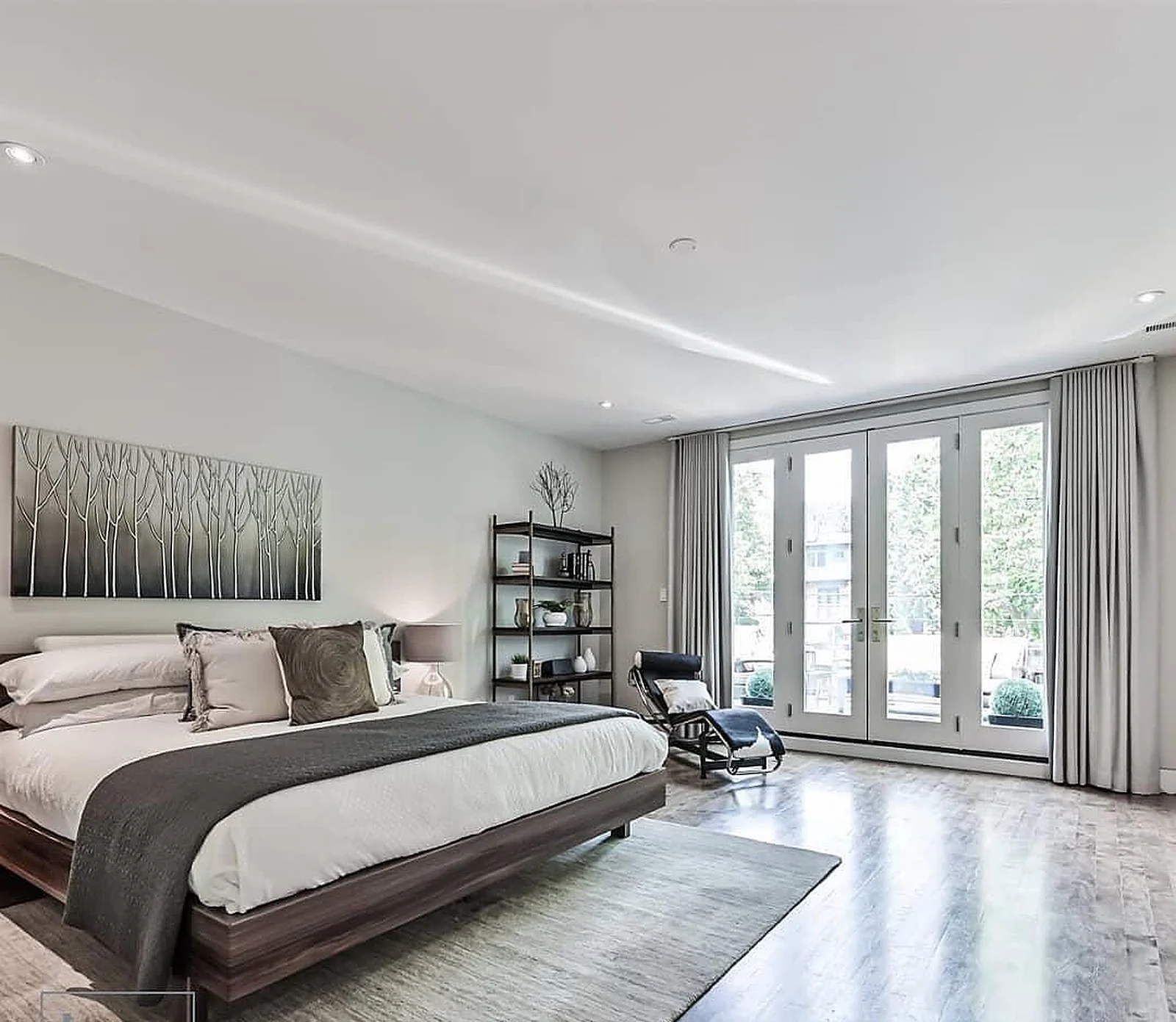 Master bedroom white walls, french doors