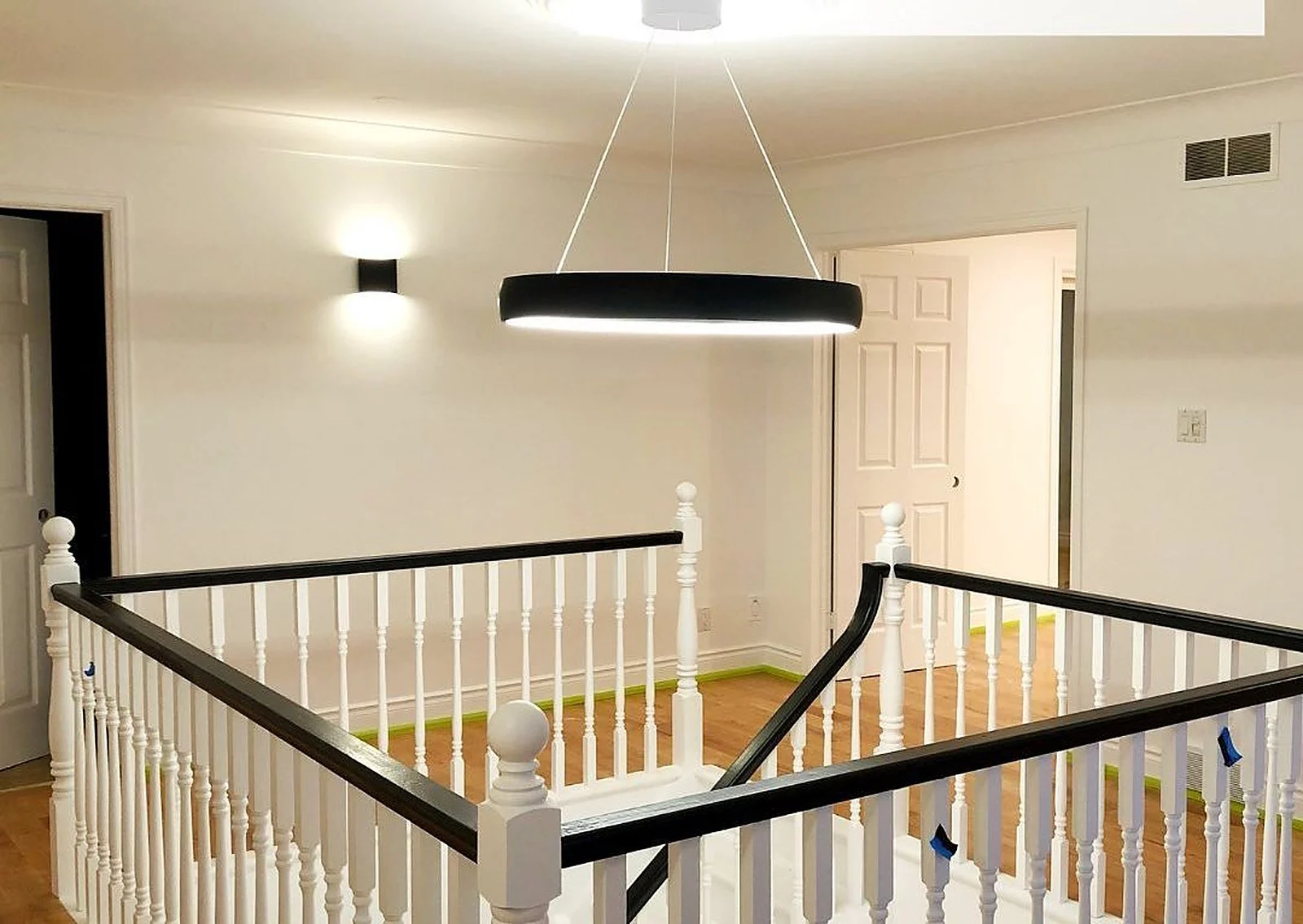Bright white landing in a South Burlington custom home