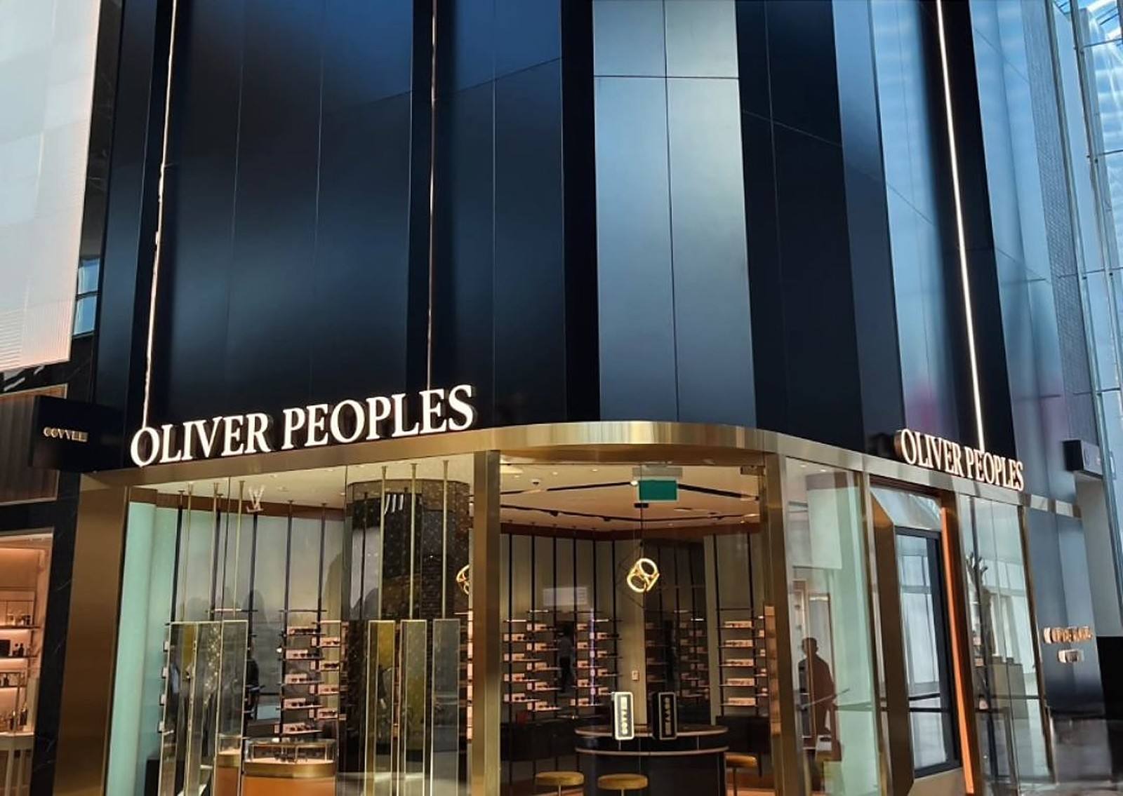 Oliver Peoples storefront at Yorkdale with black exterior panels
