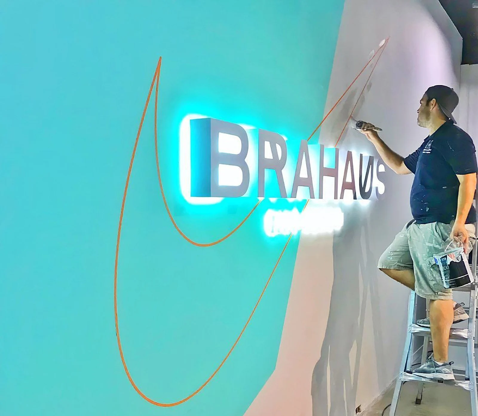 Painting a feature wall for Nike at the Eaton Centre
